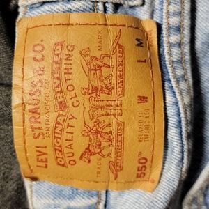Light wash Levi's 550, sz12, med length